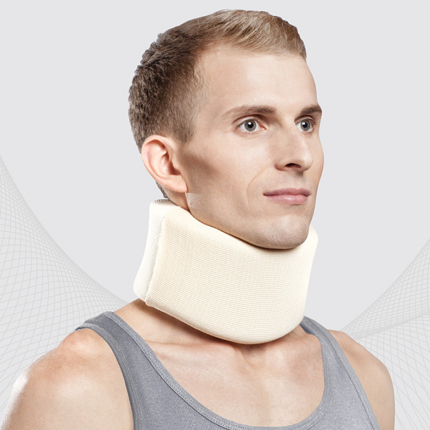Medical head holder, with soft fixation for neck vertebra