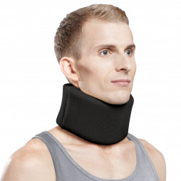 Medical head holder, with soft fixation for neck vertebra